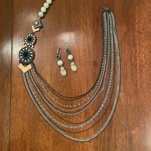 Long chains necklace with stones.